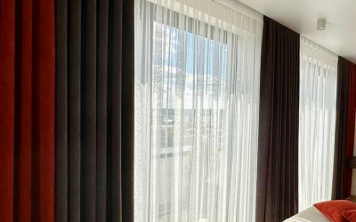 Bedroom curtains. A bedroom where everything is designed to create an atmosphere of calmness and depth.