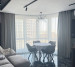 Curtains on a bay window in a studio apartment 20202128