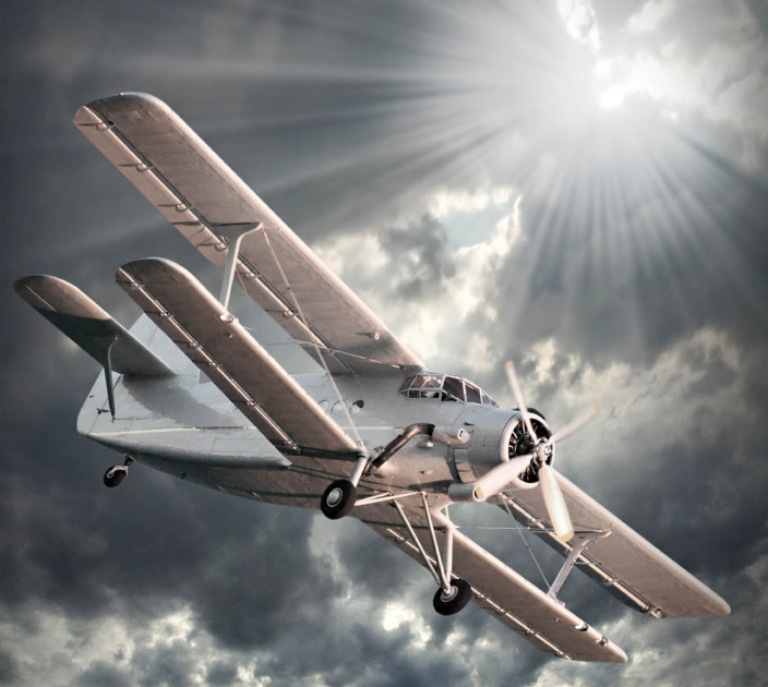 Photo wallpapers Wallstyle Airplane in the rays of the sun 128512934