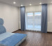 Straight curtains and polka dot tulle in the nursery 20202233